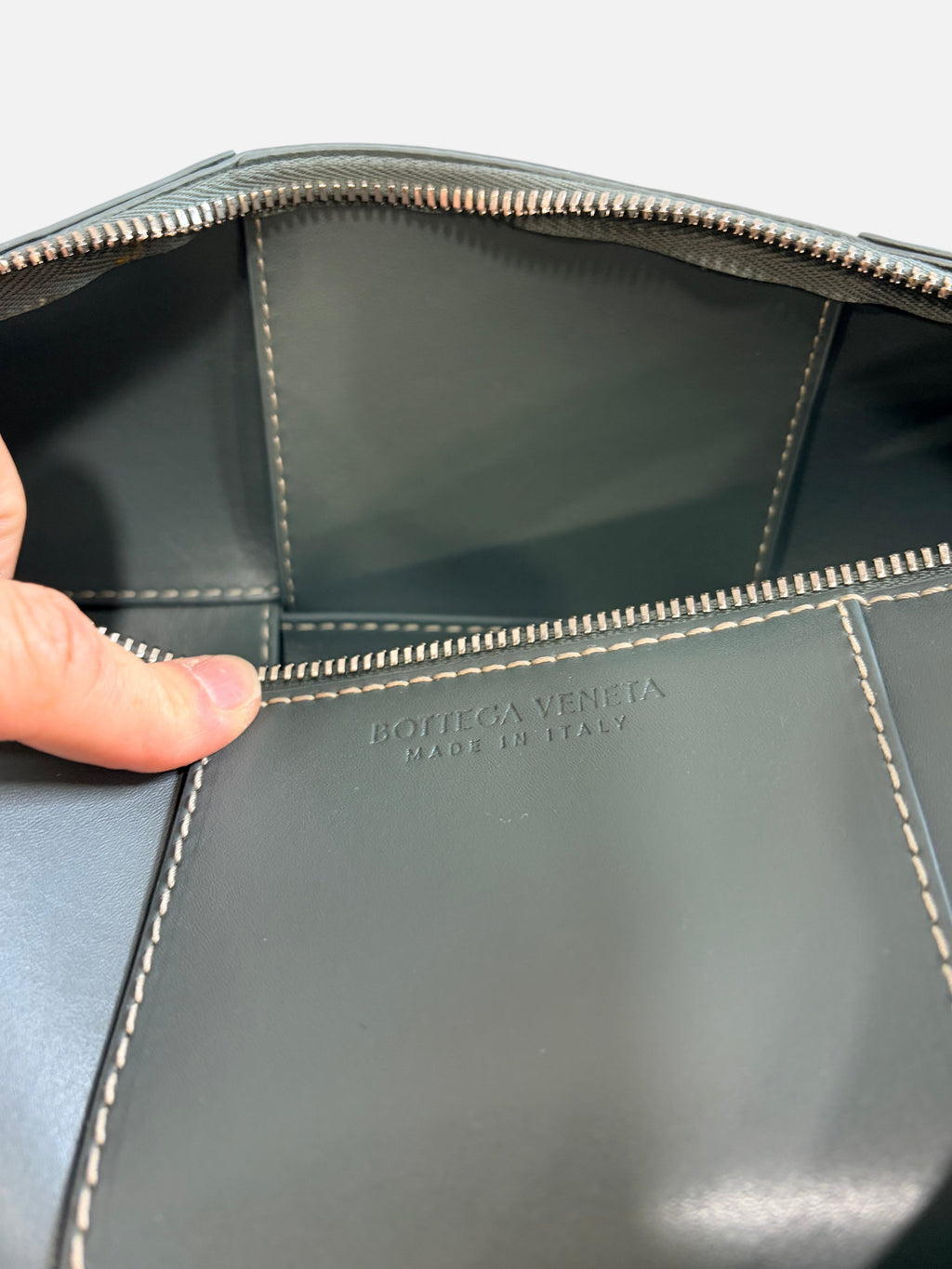 CURATED by Kira Bottega Veneta green leather bag interior with silver zipper and embossed logo made in Italy