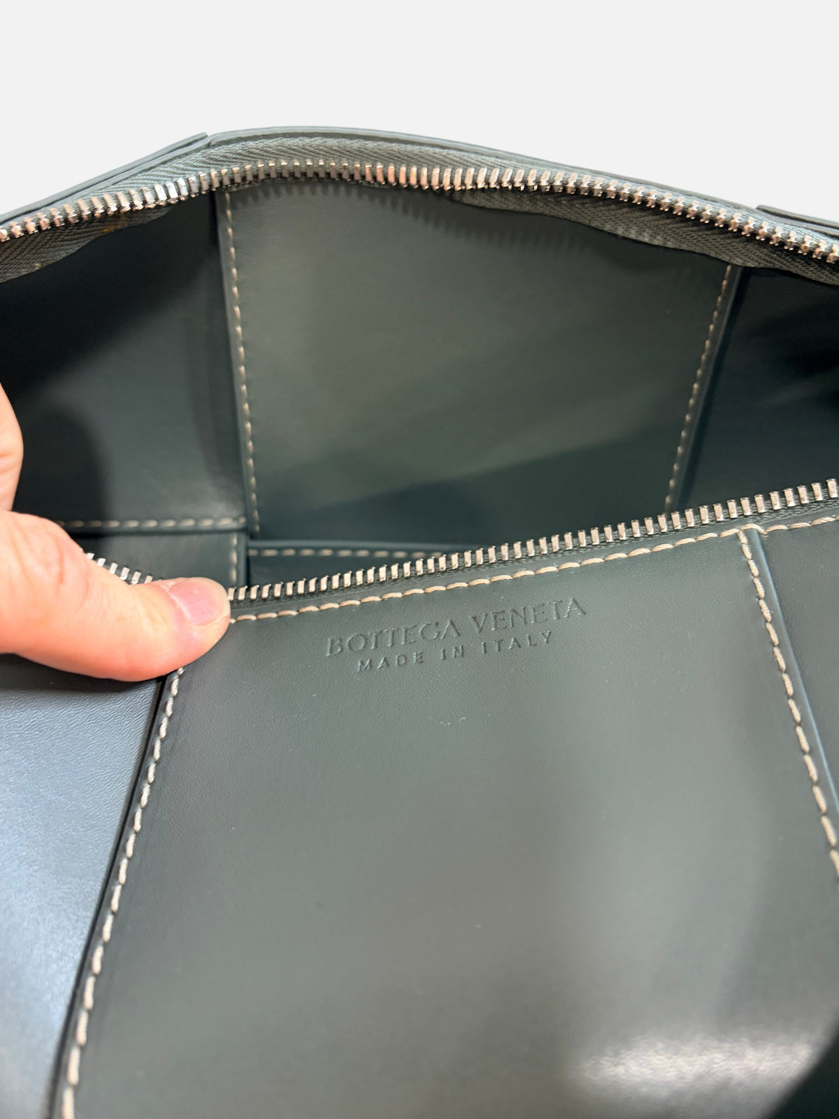 CURATED by Kira Bottega Veneta green leather bag interior with silver zipper and embossed logo made in Italy