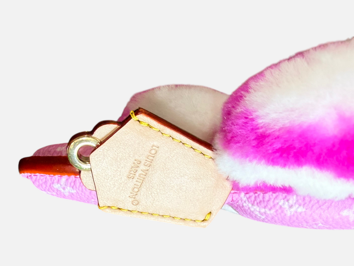 CURATED by Kira Louis Vuitton Vivienne Fashionista bag charm in pink leather and mink with gold-toned metal hardware.