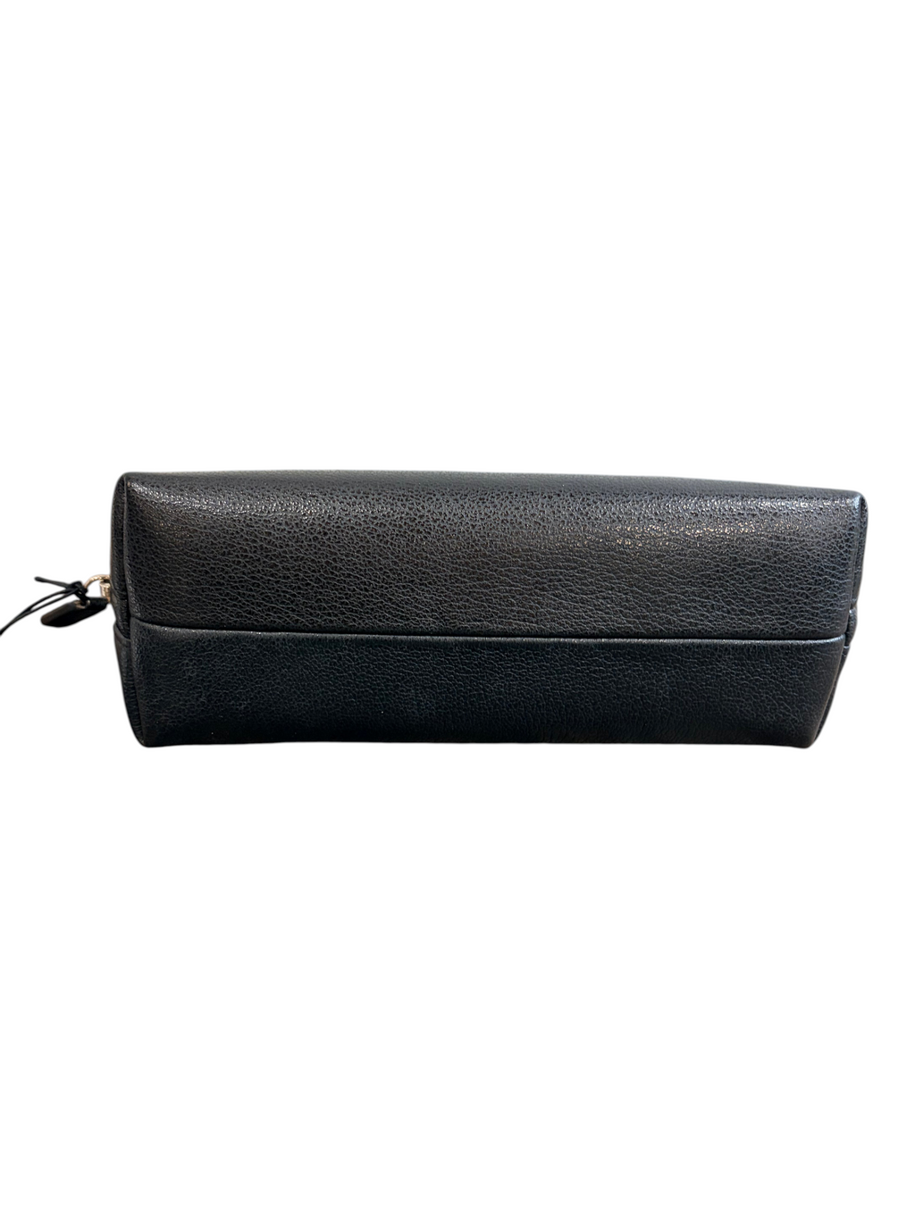 CURATED by Kira black leather Chanel cosmetic pouch with a rectangular silhouette sitting on a wooden surface.