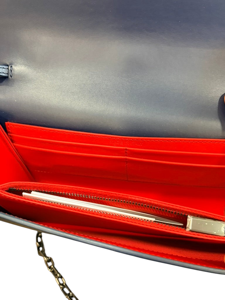 CURATED by Kira Christian Louboutin Paloma leather crossbody clutch with vibrant red interior and card slots
