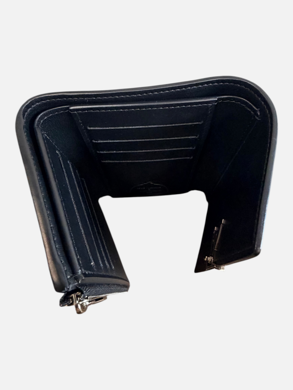CURATED by Kira Louis Vuitton Capucines compact wallet interior view showing black calfskin leather and card slots