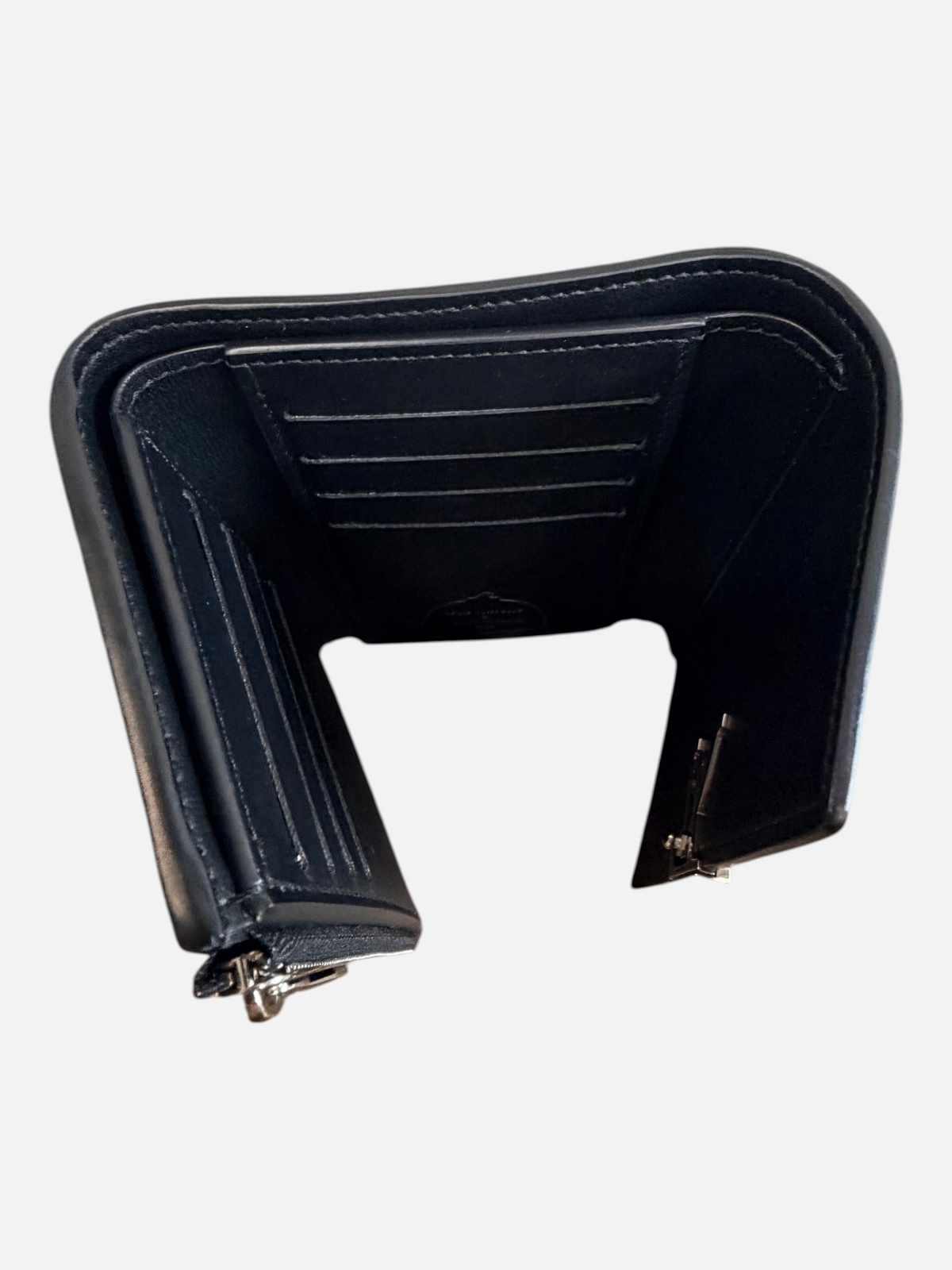 CURATED by Kira Louis Vuitton Capucines compact wallet interior view showing black calfskin leather and card slots