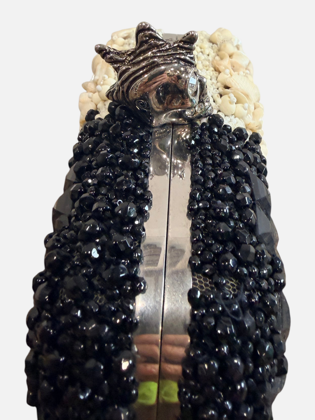 CURATED by Kira Alexander McQueen box clutch with black beads, ivory shells, and a silver skull kiss lock clasp.
