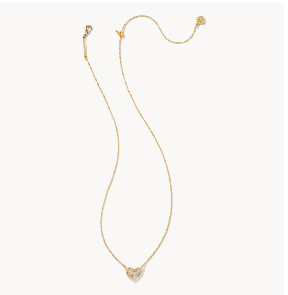 CURATED by Kira Kendra Scott Ari gold heart necklace with white CZ pavé crystals on a 14k gold-plated brass chain.