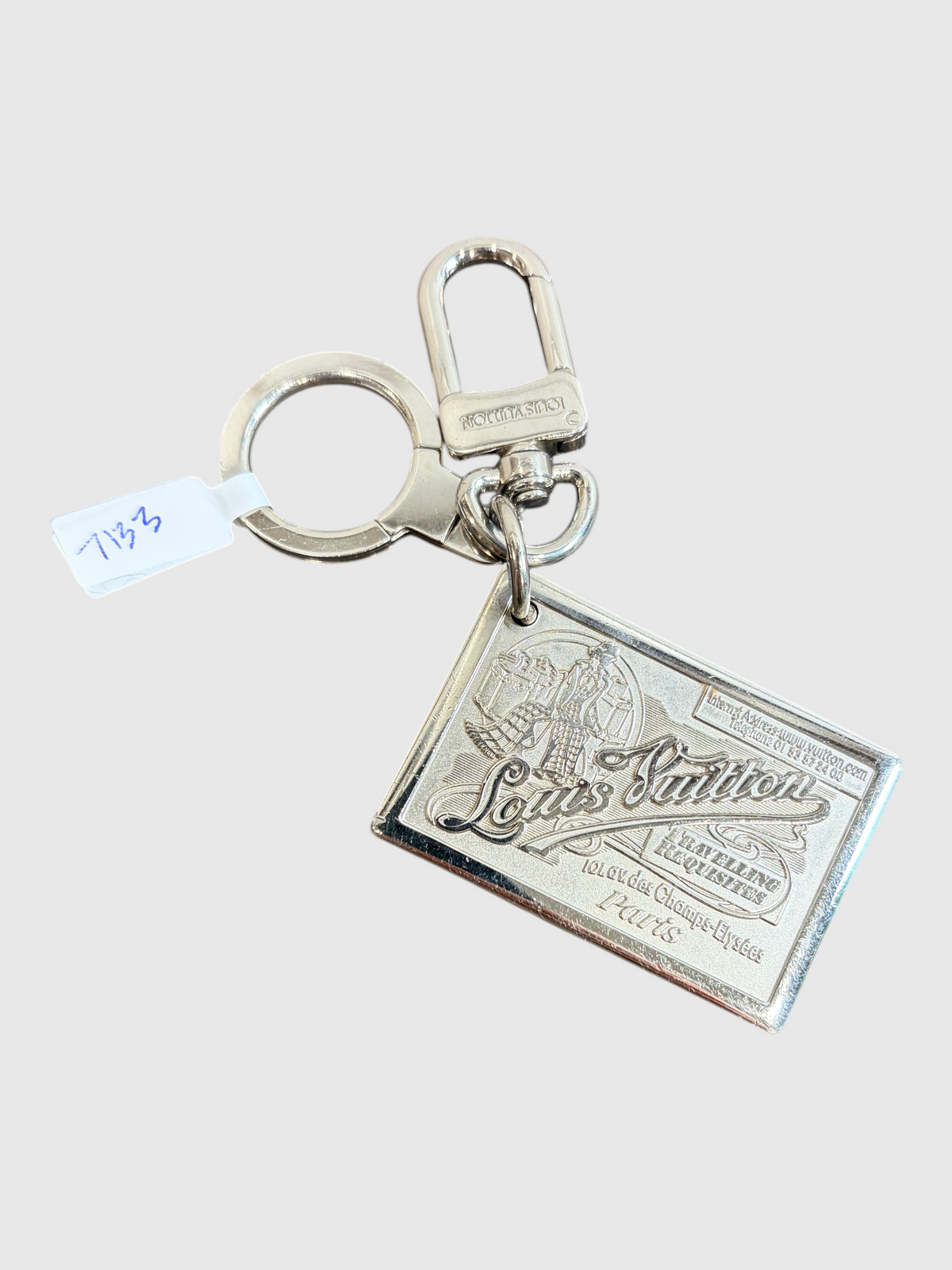 CURATED by Kira pre-owned Louis Vuitton Traveling Requisites silver-tone metal keychain bag charm