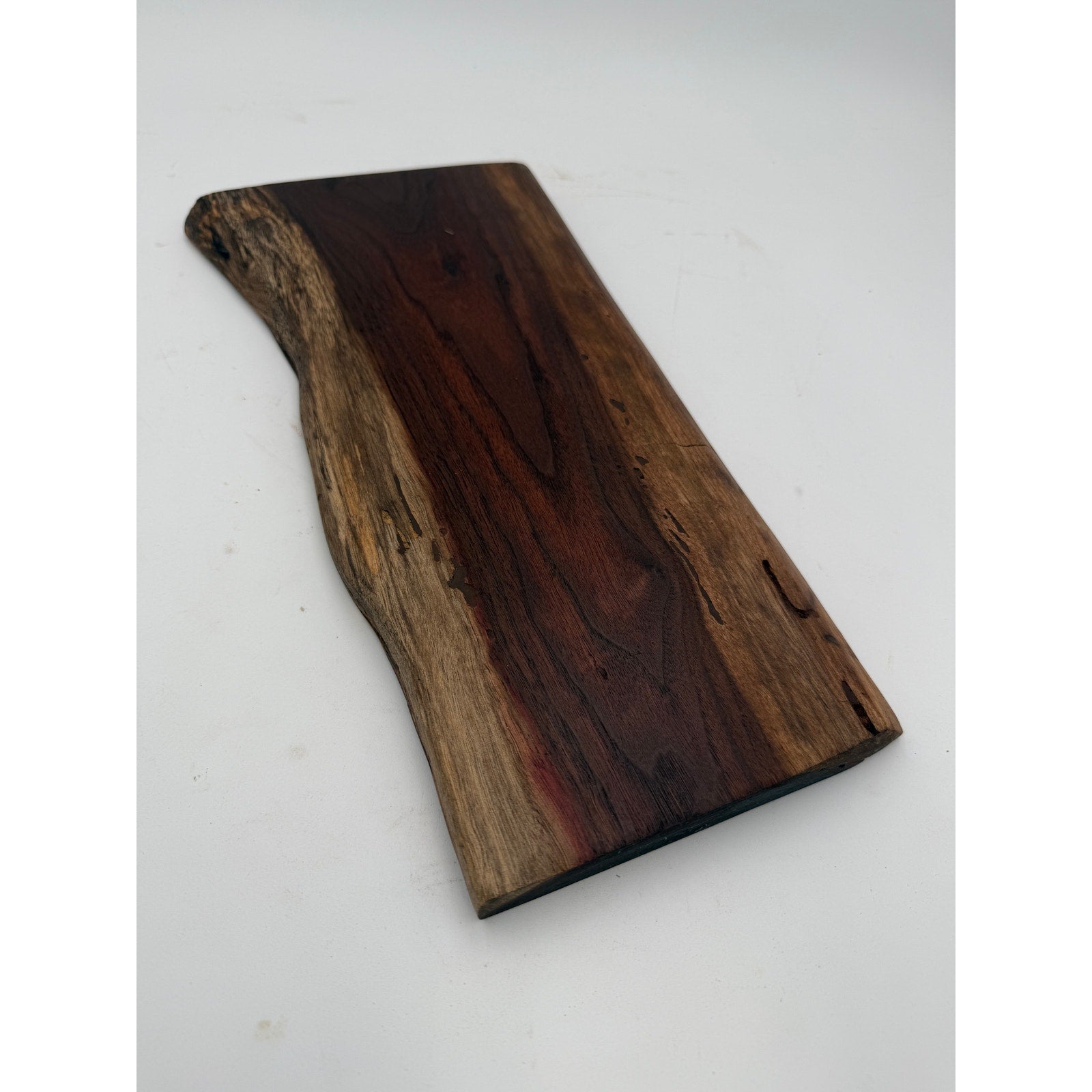 Handcrafted Walnut Live Edge Charcuterie Board, 15x8x1 size, rich dark coloring, intricate grain pattern, food safe finish