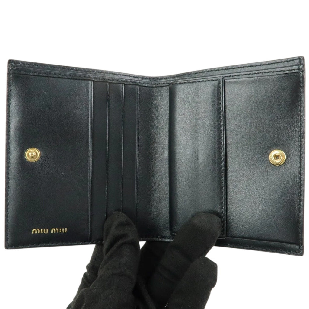 MIU MIU embossed patent leather bi-fold compact wallet