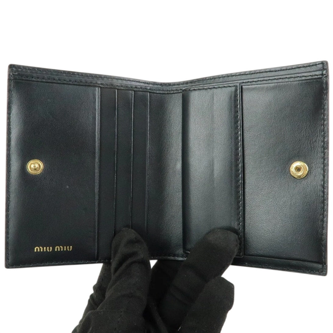 MIU MIU embossed patent leather bi-fold compact wallet