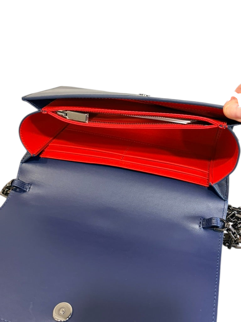 CURATED by Kira Christian Louboutin Paloma navy calf leather crossbody clutch with vibrant red interior lining