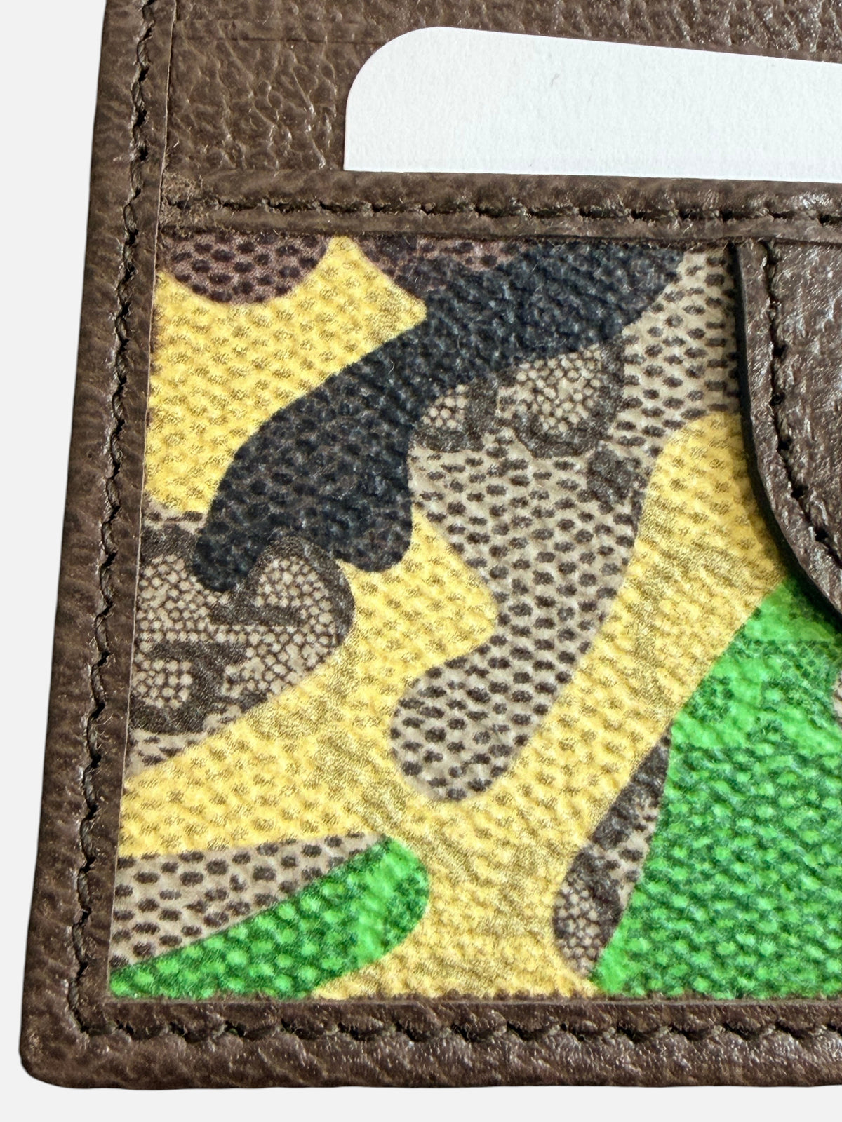 CURATED by Kira Gucci GG monogram cardholder in brown, green, and yellow camouflage coated canvas with stitched trim