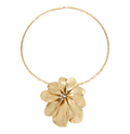 CURATED by Kira gold-plated collar necklace featuring a large sculptural flower pendant on a round wire band.