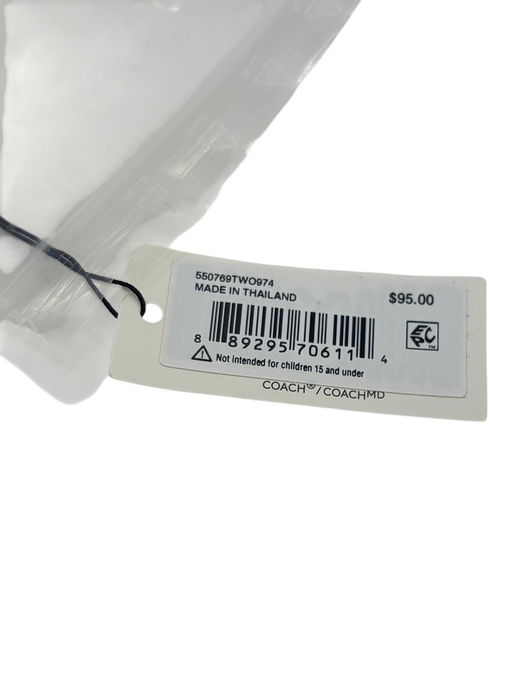 CURATED by Kira Coach necklace product tag showing model number 550769TWO974 and price tag