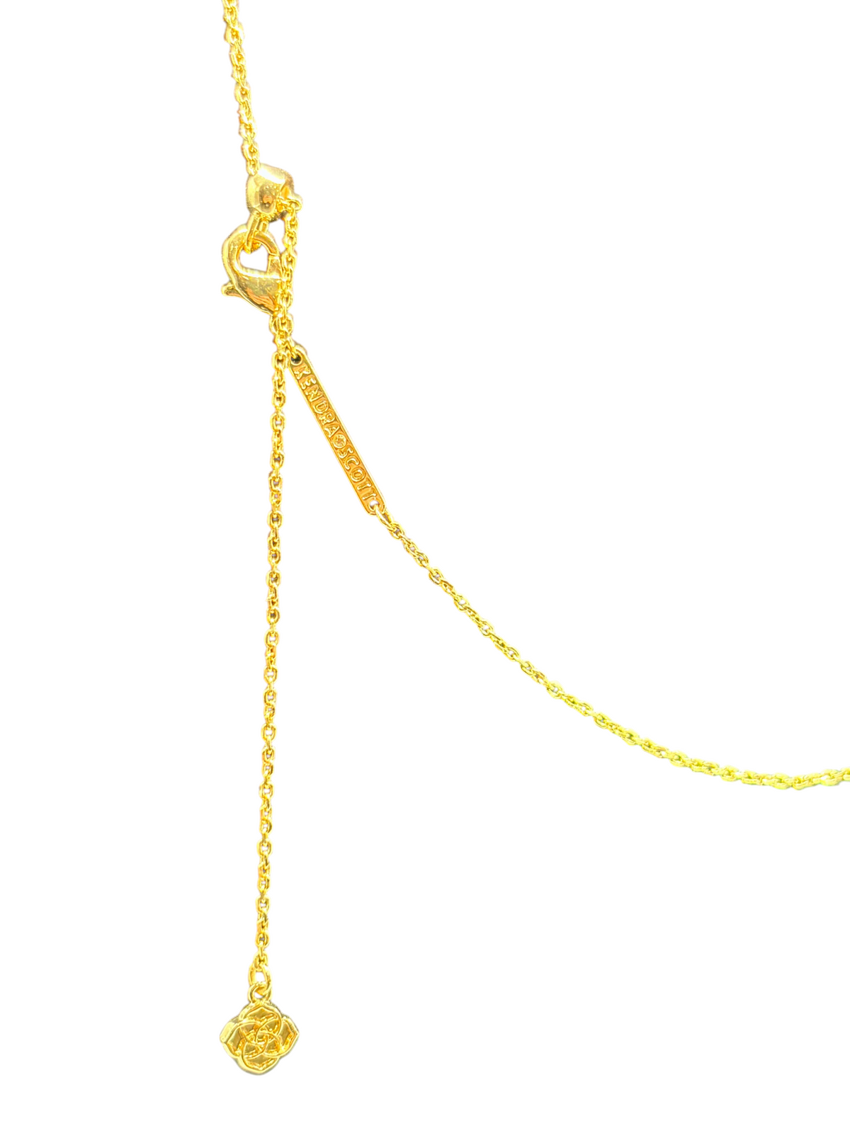 CURATED by Kira Kendra Scott gold chain necklace with lobster clasp and adjustable slider bead on black display