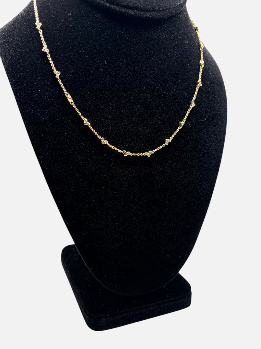 CURATED by Kira Kendra Scott Haven Pavé heart necklace in 14K gold-plated metal with cubic zirconia on black display