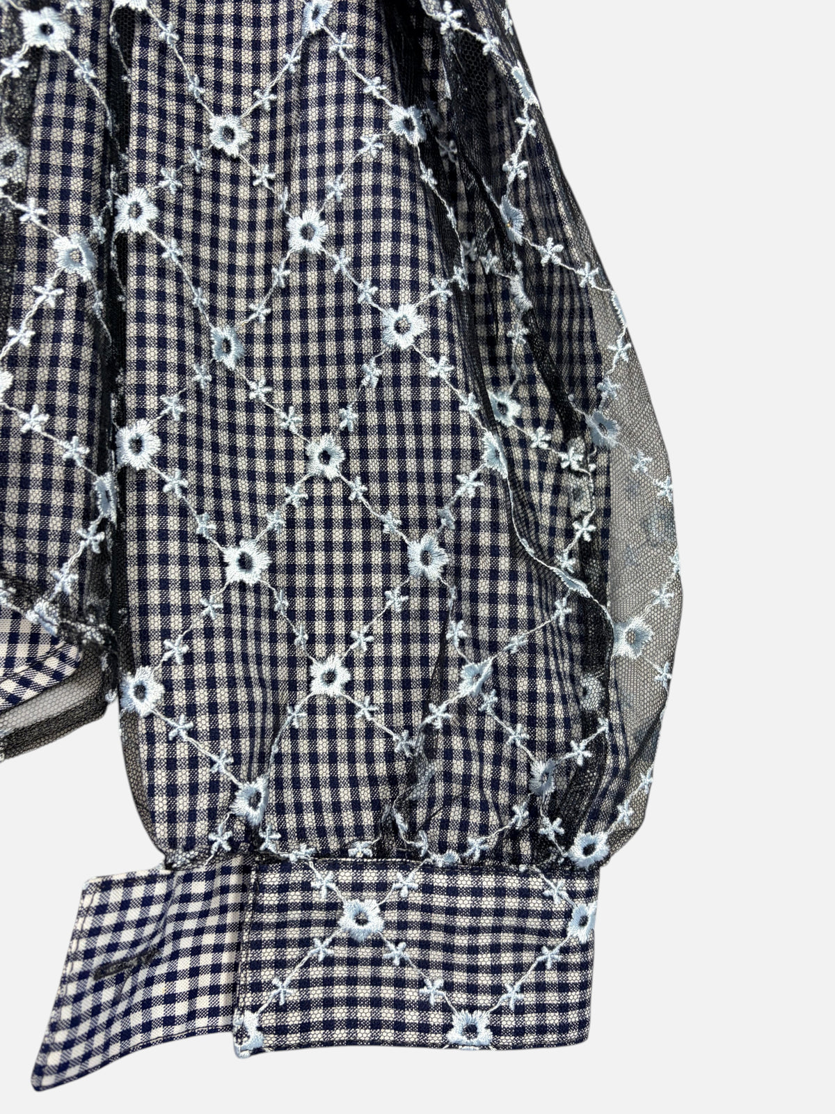CURATED by Kira Sandy Liang Toney top featuring navy gingham fabric with a sheer embroidered floral mesh overlay