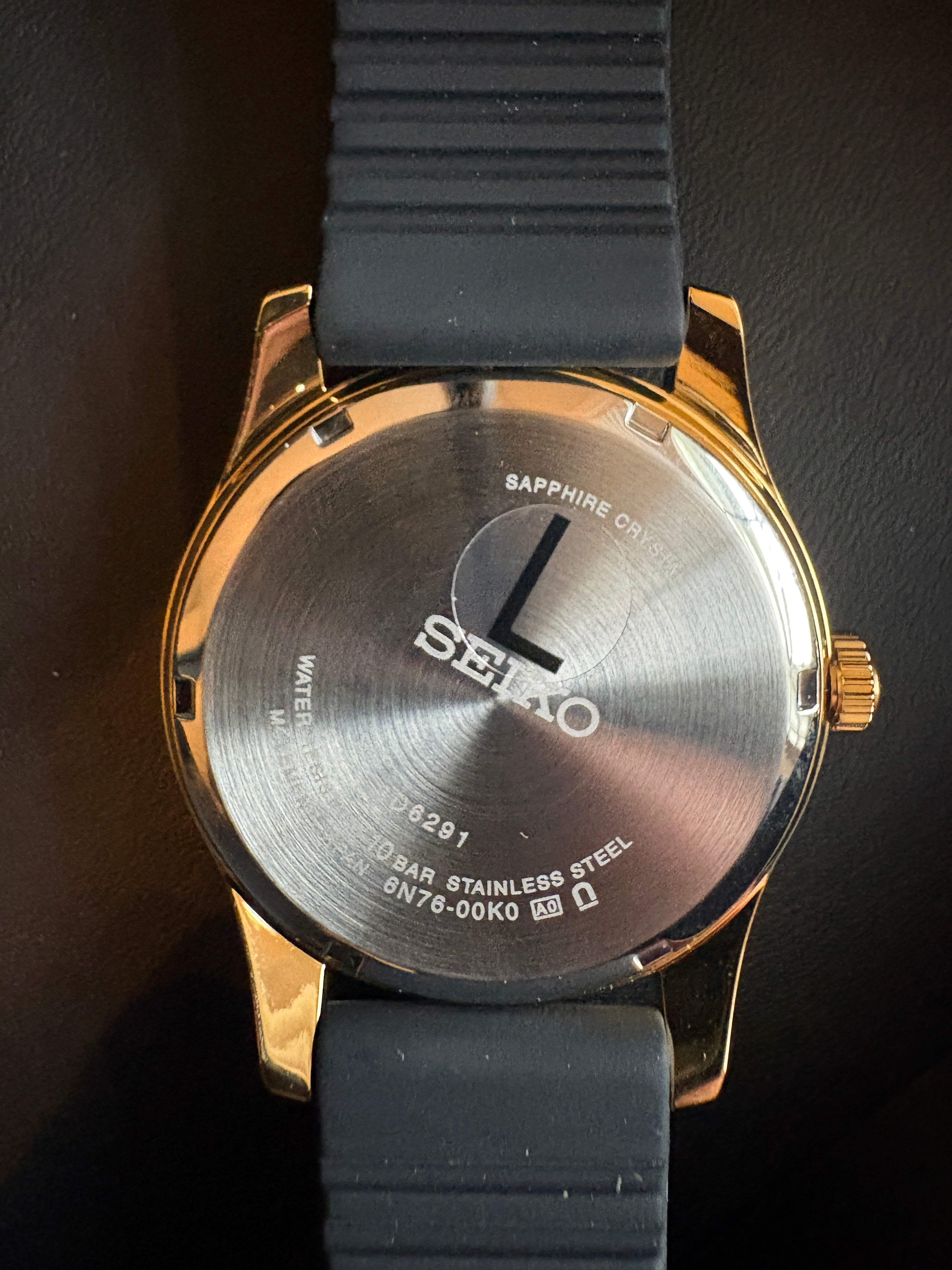 Seiko Essentials SUR560 Mens Black Dial Gold Tone Quartz Watch Sapphire 39.5mm