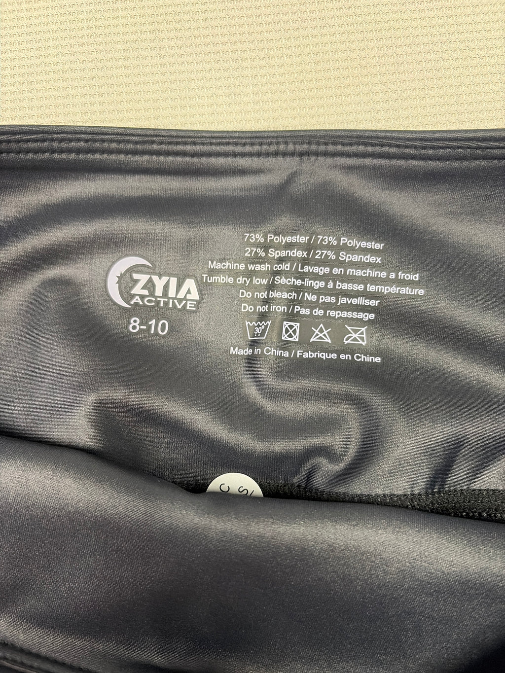 ZYIA Active Black Reflective Metallic Light n Tight Hi-Rise Leggings. Size 8-10