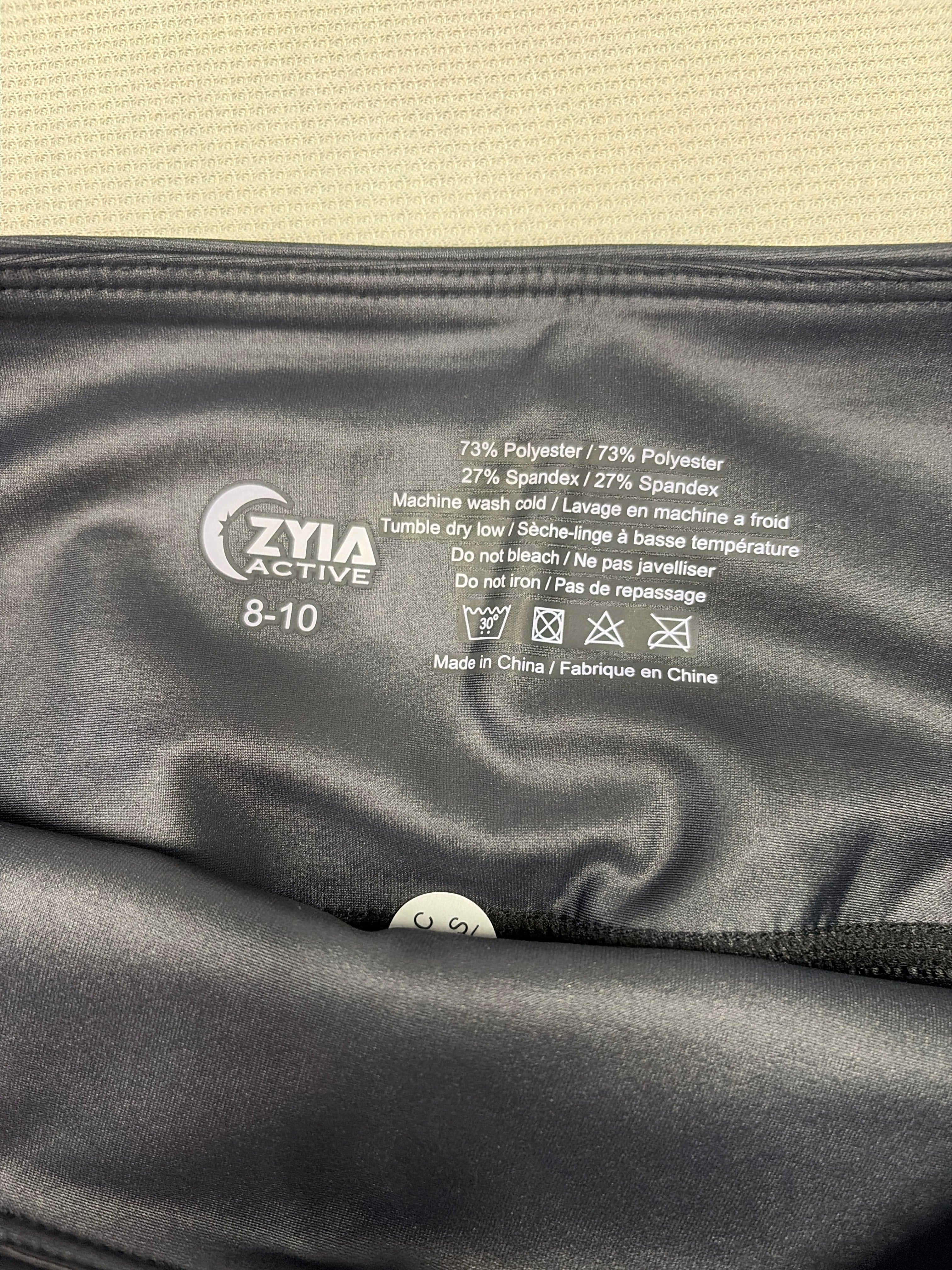 ZYIA Active Black Reflective Metallic Light n Tight Hi-Rise Leggings. Size 8-10