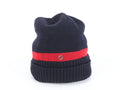 Navy blue beanie with a red band featuring a logo on a white background
