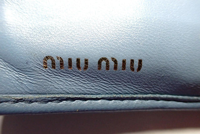 6515 - Miu Miu Matelasse Bi-Fold Wallet Blue