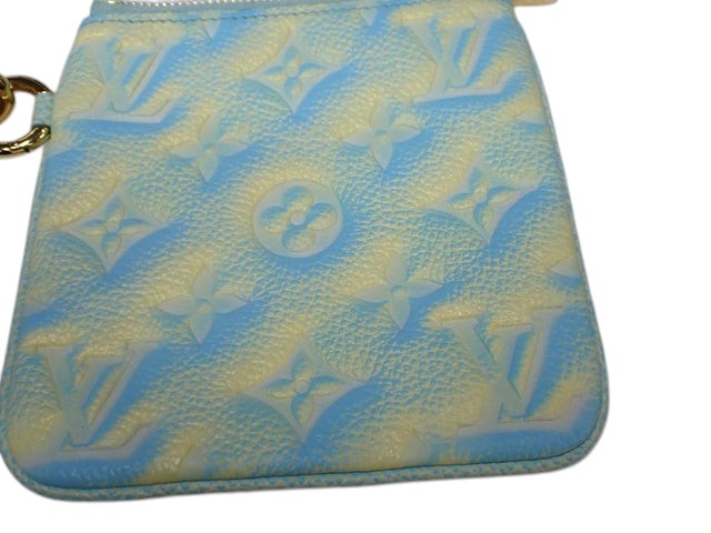 7049 - Louis Vuitton Pochette Trio Empreinte M68756 Multi