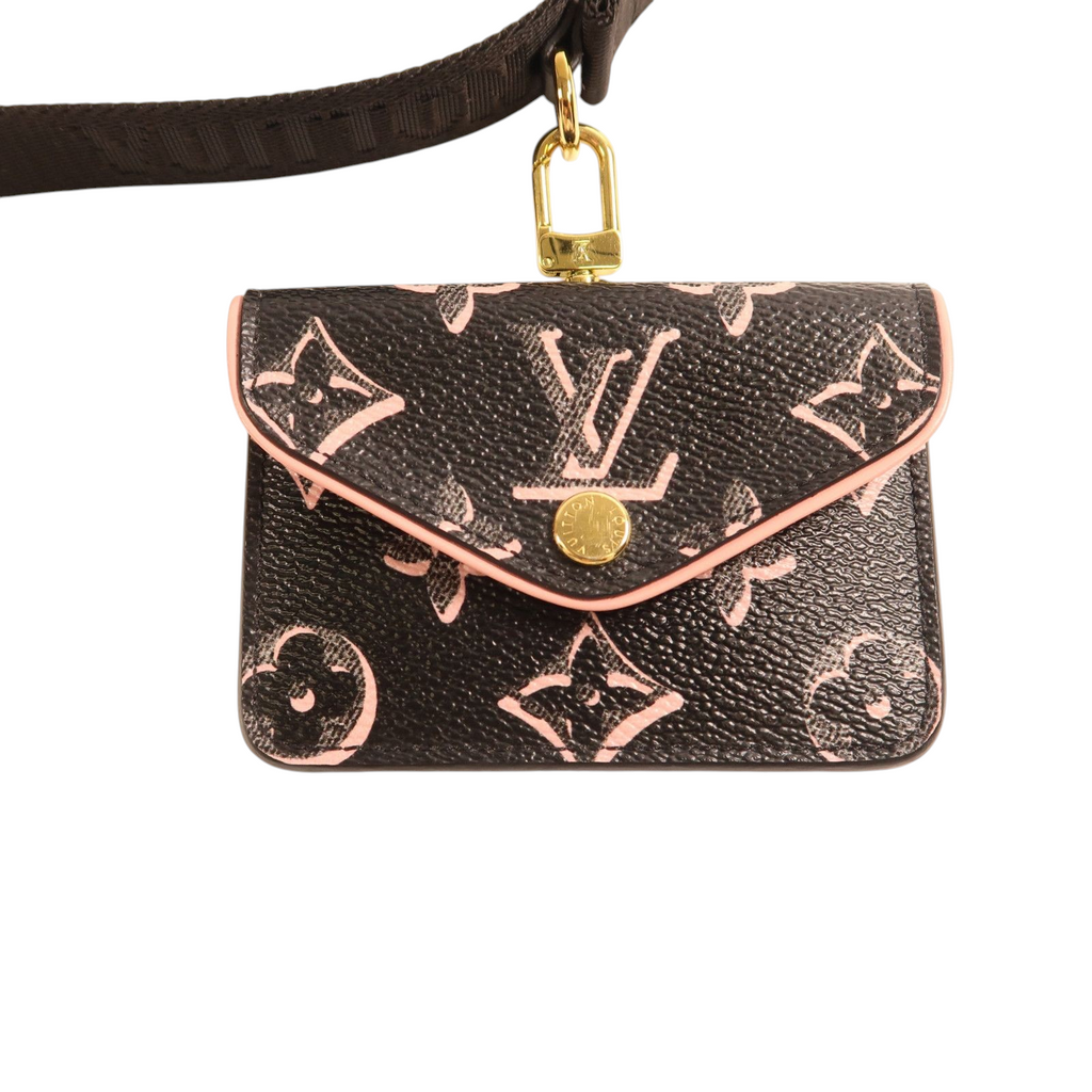 CURATED by Kira Louis Vuitton Felicie Strap & Go pochette in black and pink monogram canvas with gold hardware.
