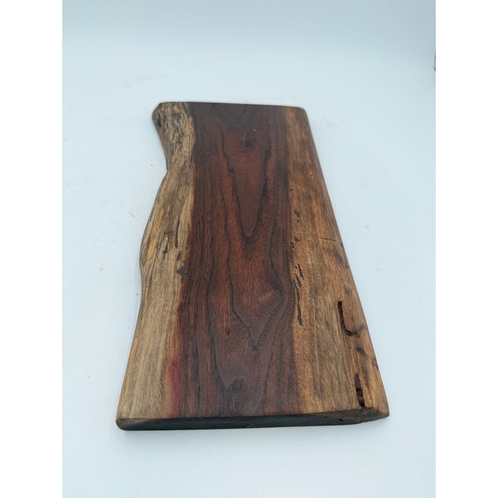 Handcrafted Walnut Live Edge Charcuterie Board, 15x8x1 size, rich dark coloring, intricate grain pattern, food safe finish