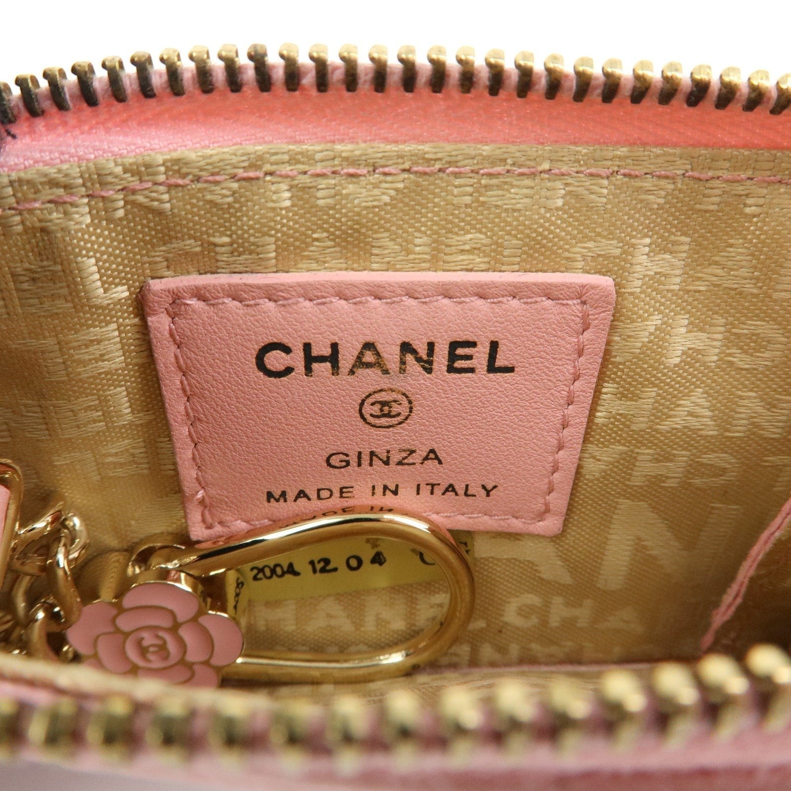 CURATED by Chanel pink leather camellia charm key case coin purse with Ginza Made in Italy label.