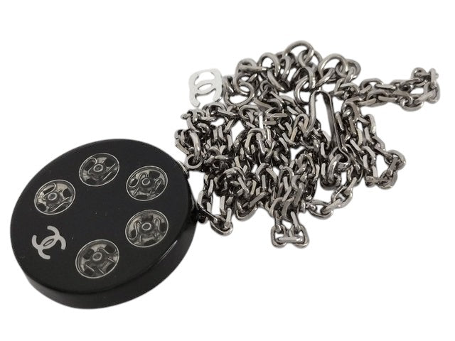 CURATED by Chanel Coco Tire Silver Necklace, 46cm, black with silver hardware and Chanel logo detail.