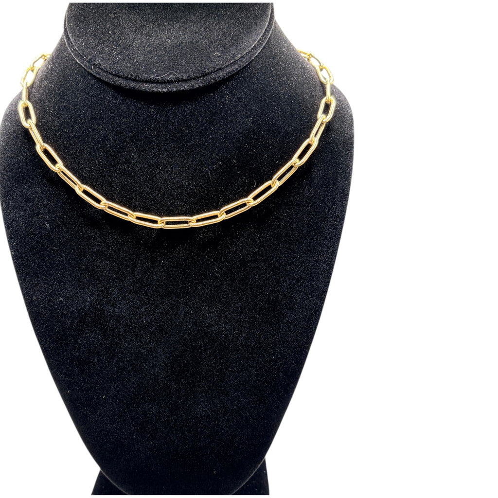 CURATED by Kira 18k Italian gold paperclip chain necklace displayed on a black velvet jewelry bust