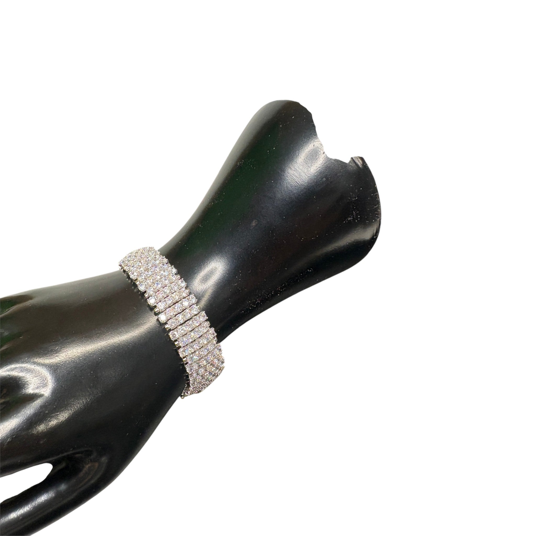 CURATED by Kira wide 5-row sterling silver tennis bracelet featuring sparkling round-cut cubic zirconia stones.