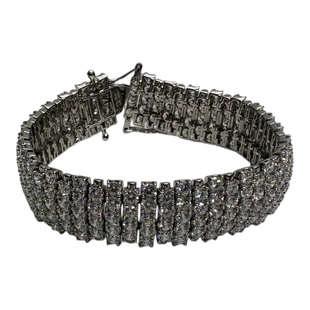 CURATED by Kira wide 5-row sterling silver tennis bracelet featuring round-cut cubic zirconia and a box lock clasp.