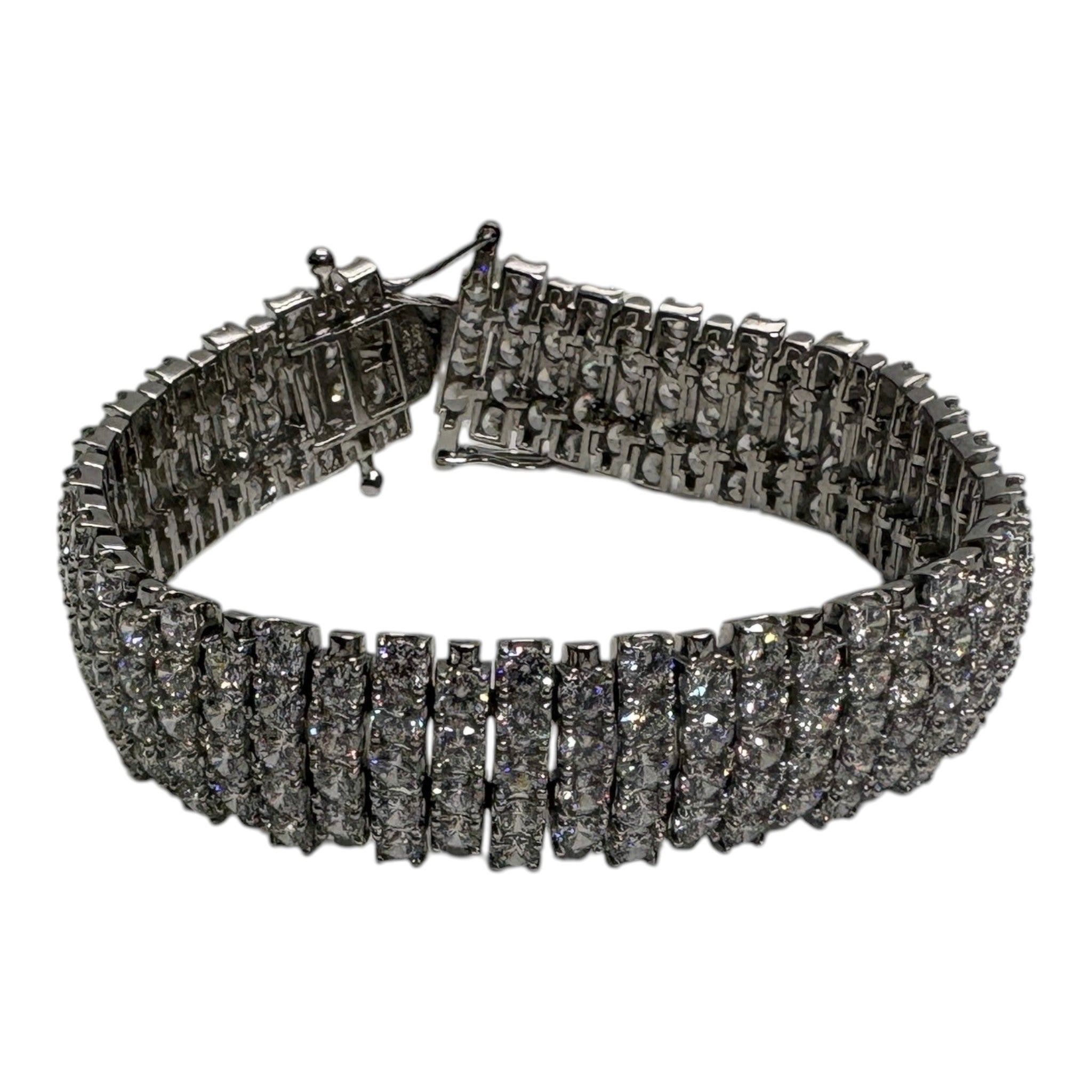 CURATED by Kira wide 5-row sterling silver tennis bracelet featuring round-cut cubic zirconia and a box lock clasp.