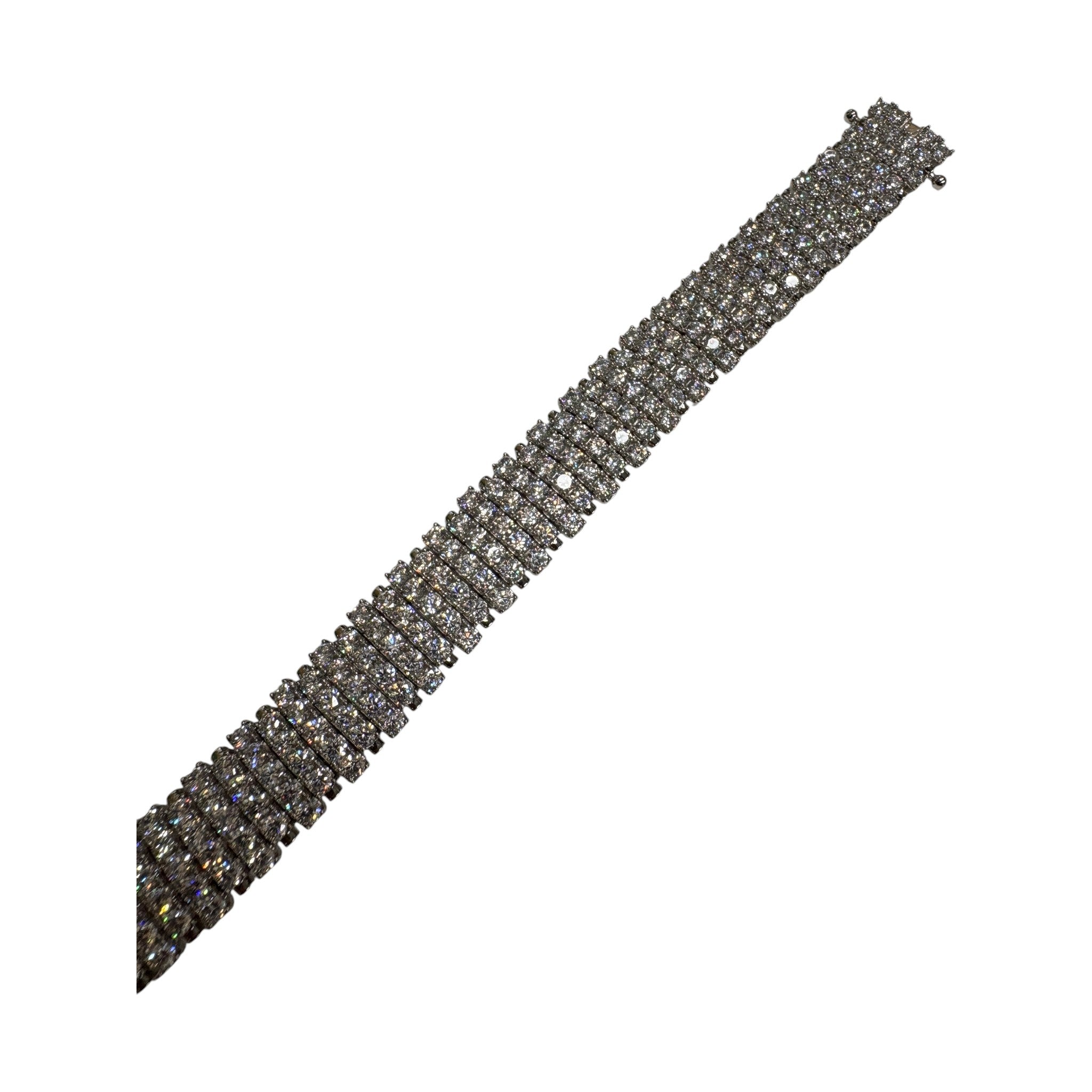 CURATED by Kira wide 5-row sterling silver tennis bracelet featuring sparkling round-cut cubic zirconia stones.