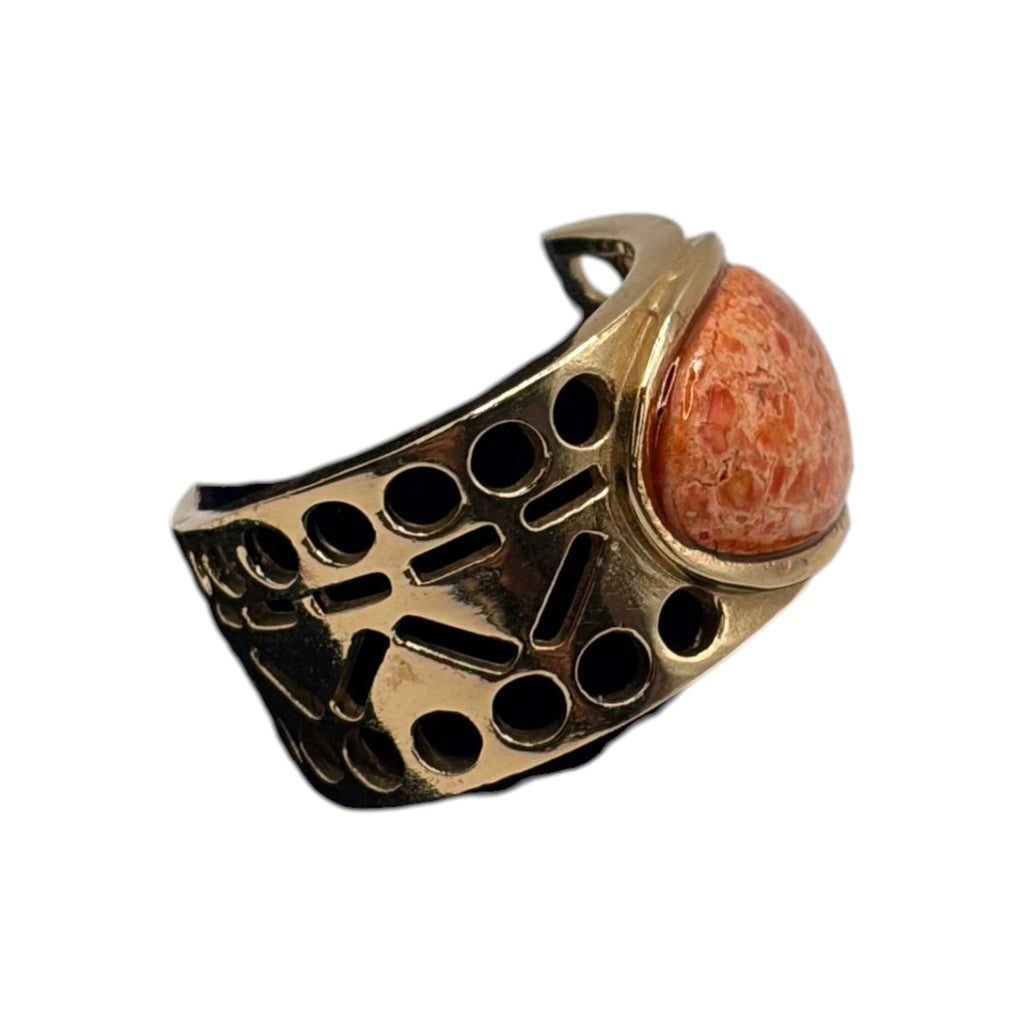 CURATED by Kira Barse Pharaoh ring featuring an oval orange sponge coral stone set in a gold-tone Egyptian band