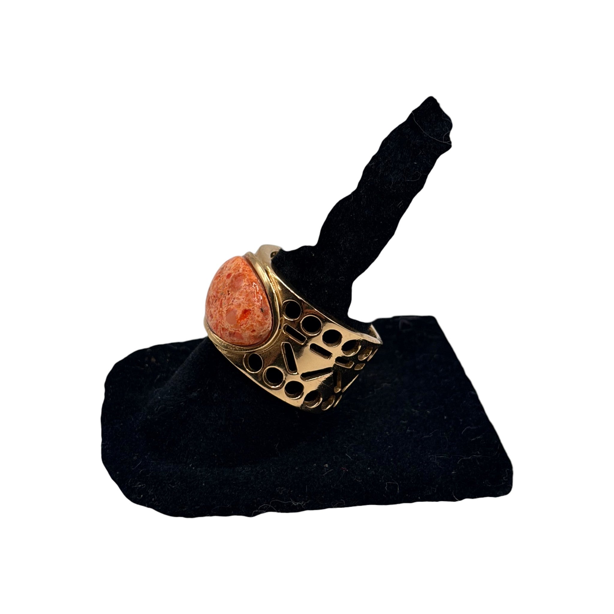 CURATED by Kira Barse Pharaoh ring featuring an oval orange sponge coral stone set in a gold Egyptian style band