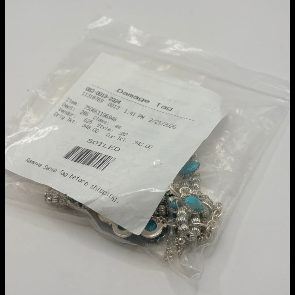 CURATED by Kira Barse sterling silver squash blossom necklace with teal turquoise stones in protective plastic bag
