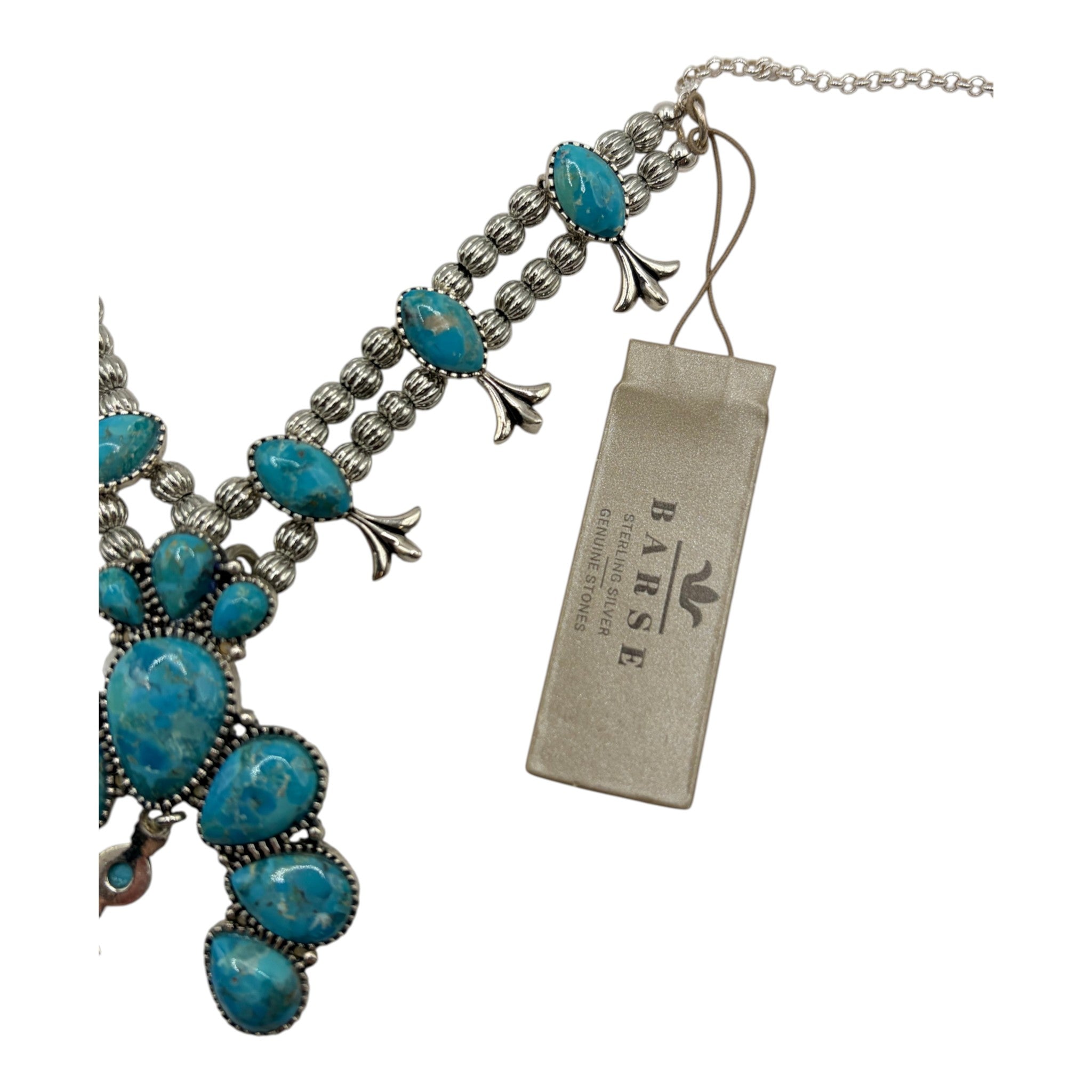 CURATED by Kira Barse sterling silver squash blossom necklace featuring teal turquoise stones and silver beads