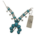CURATED by Kira Barse sterling silver squash blossom necklace featuring teal turquoise stones and intricate metalwork