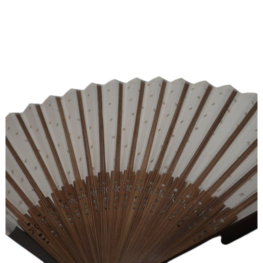 CURATED by Kira beige Celine folding fan with wooden frame and delicate patterned fabric in a presentation box