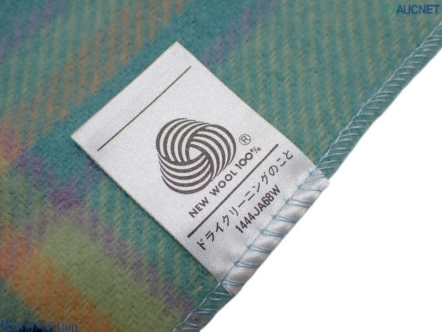 CURATED by Kira Celine unused green wool throw blanket with brand tag detail