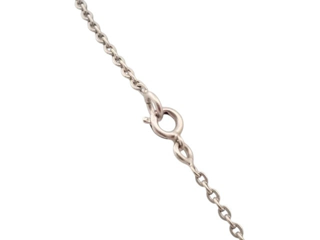 CURATED by Kira Chanel Coco round necklace featuring a silver and gold chain with a secure spring ring clasp