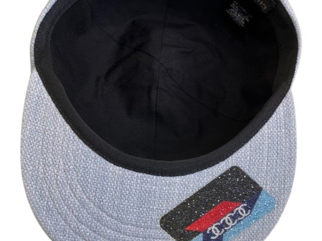 CURATED by Kira Chanel denim hat interior view showing black lining and branded label, size 54cm
