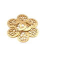 CURATED by Kira Chanel gold-tone metal brooch featuring an intricate floral Coco Mark design