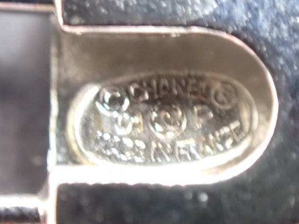 CURATED by Kira Chanel Icon Series silver brooch hallmark detail showing Made in France engraving