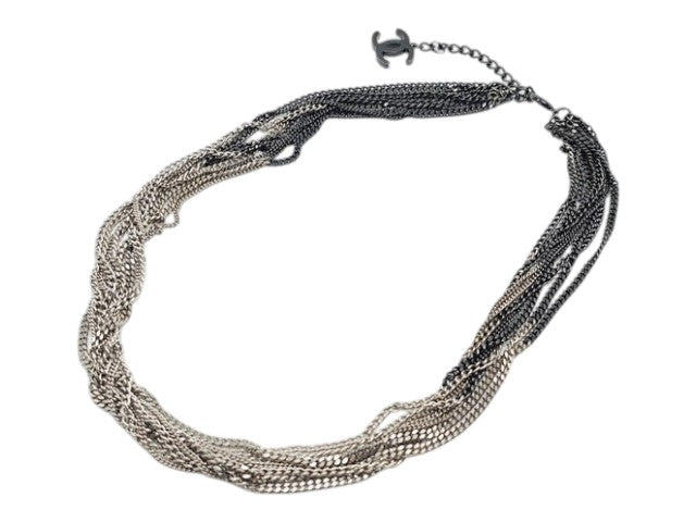 CURATED by Kira CHANEL multi-strand silver and gunmetal chain necklace with iconic CC logo charm