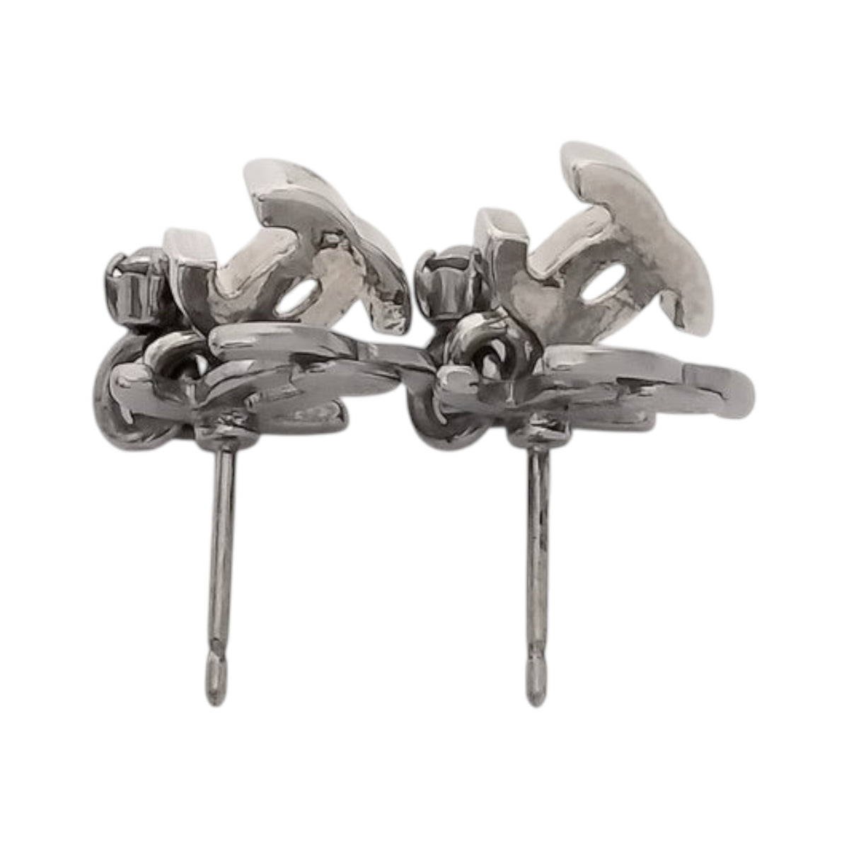 CURATED by Kira Chanel Coco silver stud earrings featuring sparkling rhinestones in a classic logo design