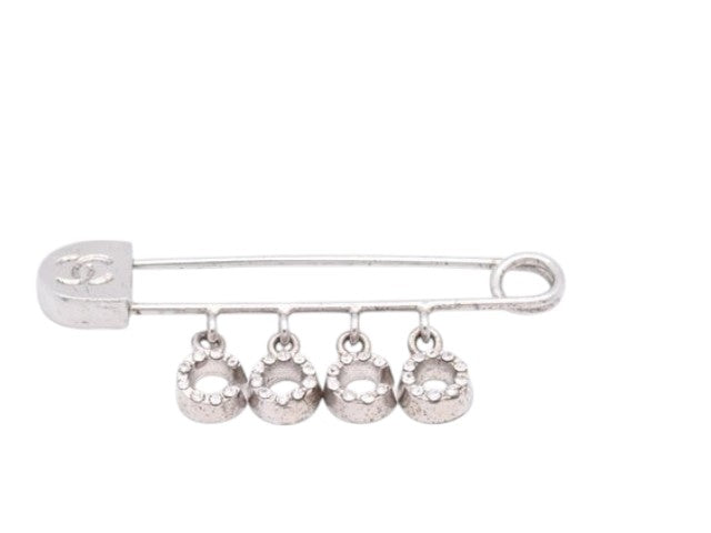 CURATED by Kira Chanel Icon Series silver safety pin brooch with dangling crystal-embellished letter charms