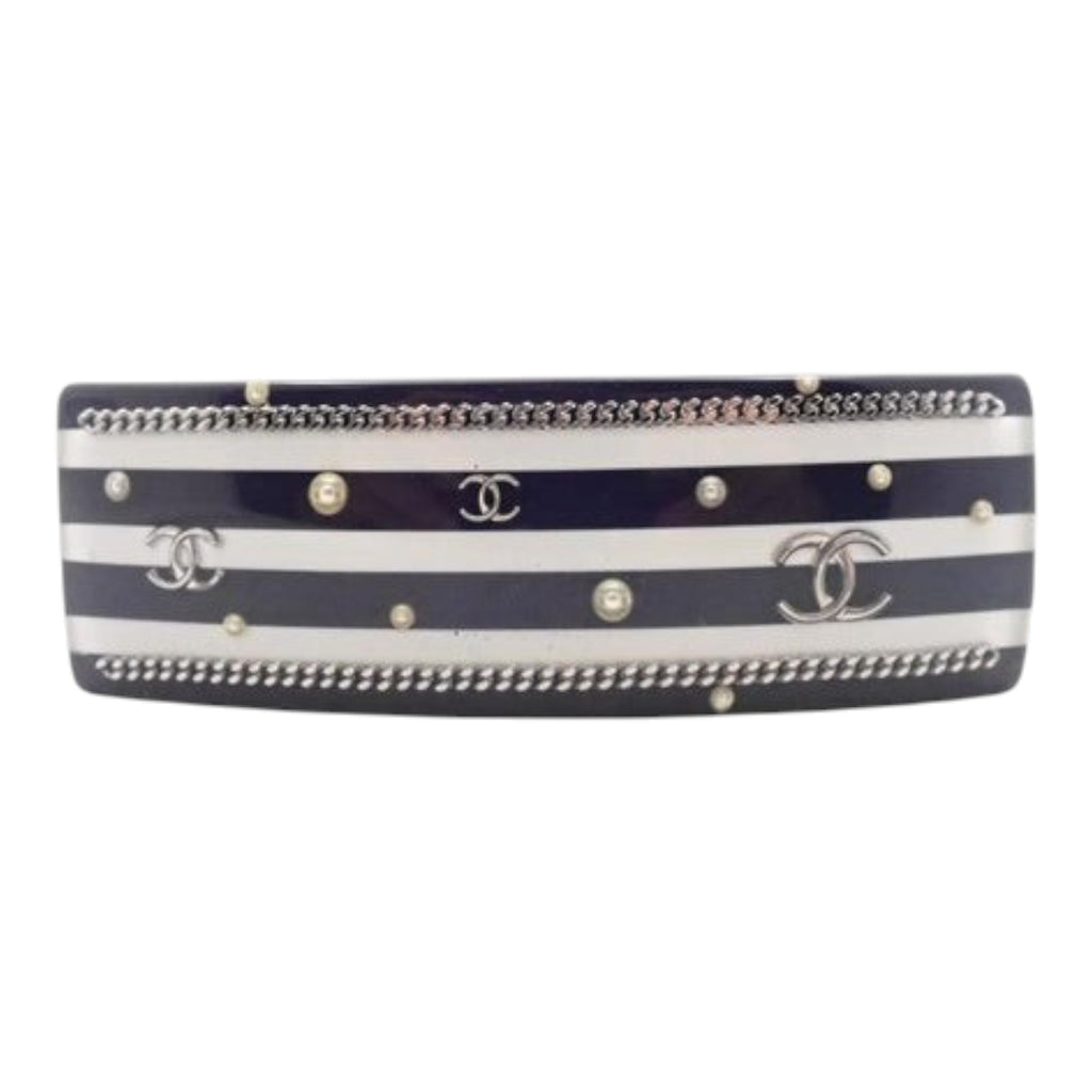 CURATED by Kira Chanel barrette in black and white stripes with silver CC logos, chain trim, and pearl accents.